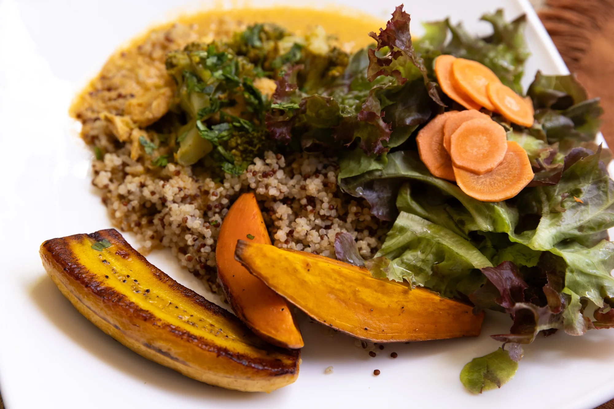 Lunch: plantains, grains, vegetables and greens