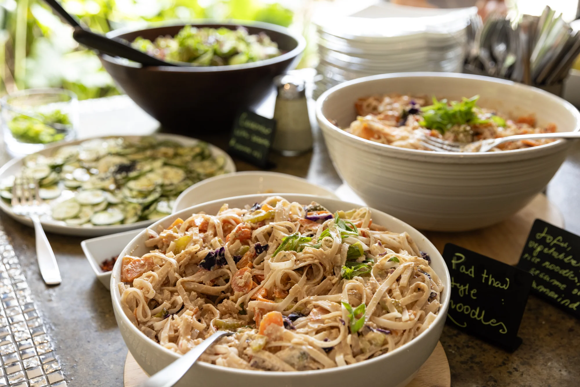 Noodles, salad and cucumber for the group